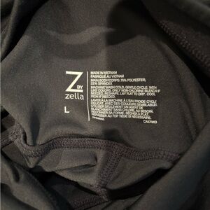 Zella Black Performance body suit flare leg